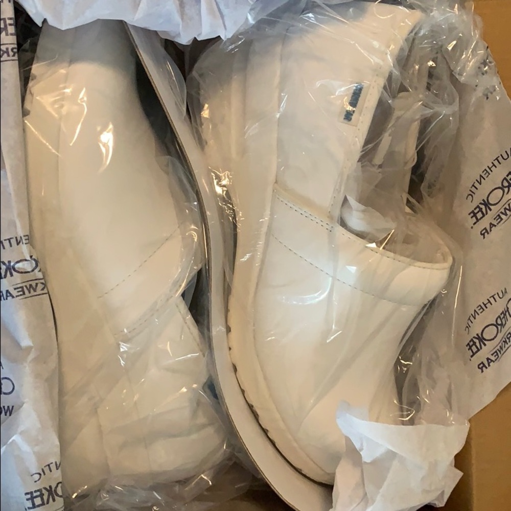 Never worn white leather Cherokee nursing clogs